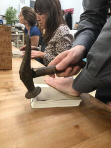 Thessaloniki 28 Oct 2019 - Aligning the sheets with a hammer Thessaloniki 28 Oct 2019 - Aligning the sheets with a hammer